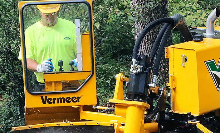 Kantojyrsin Vermeer SC552 käyttäjän läsnäolojärjestelmä.